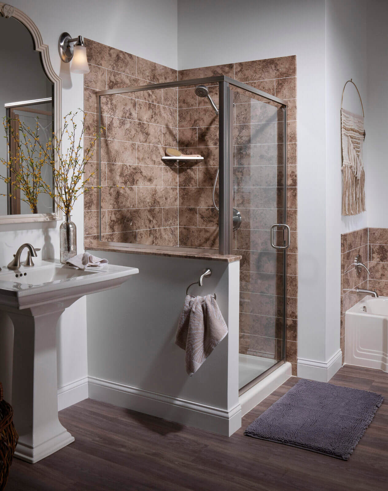 Glass Shower Doors A compact bathroom equipped with a shower, sink, and toilet, illustrating a typical setup for personal care
